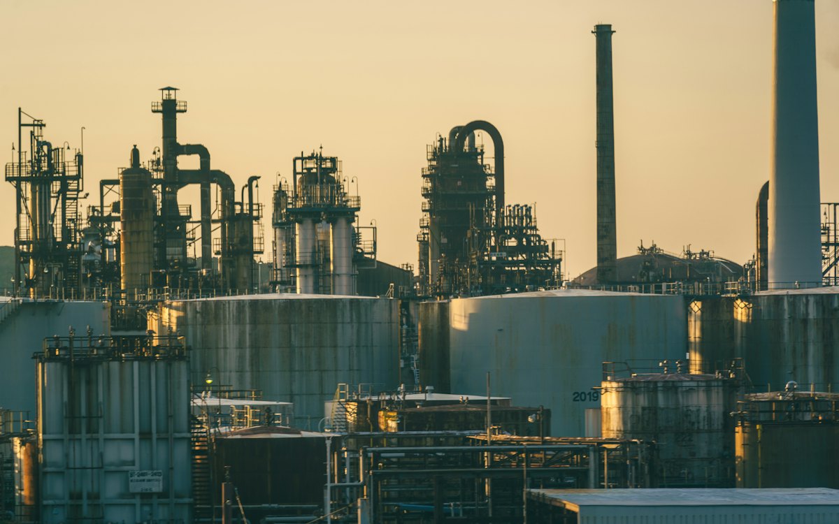 Oil refinery at sunset
